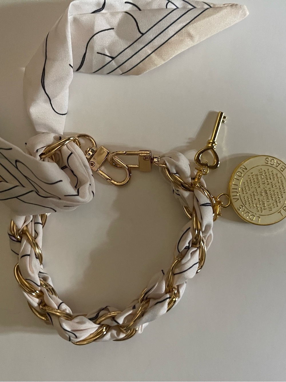 Bag charm White and Gold Chain Bracelet with Silk Wrap and Medallion